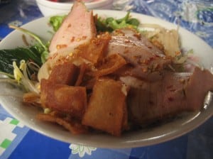 Cau Lao - a Vietnamese noodle dish with crispy wontons and pork