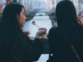 eating sushi with chopsticks