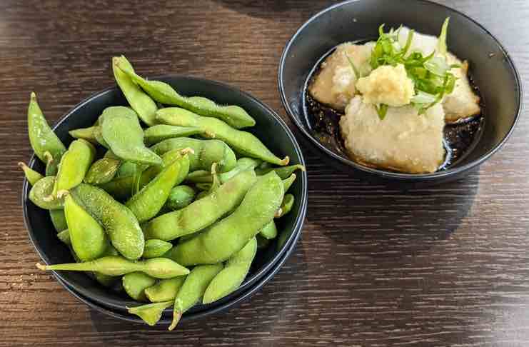 Our Visit To Kaiten Zushi Nomad – Sushi By The Belt edamame and agedashi Kaiten Zushi Nomad ny