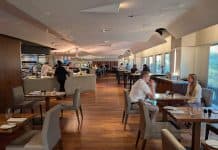 Katie’s Review of Conrad New York Downtown and ATRIO Wine Bar & Restaurant: Quiet Luxury Meets Farm-to-Table Freshness The main dining room of ATRIO Wine Bar & Restaurant at conrad new york