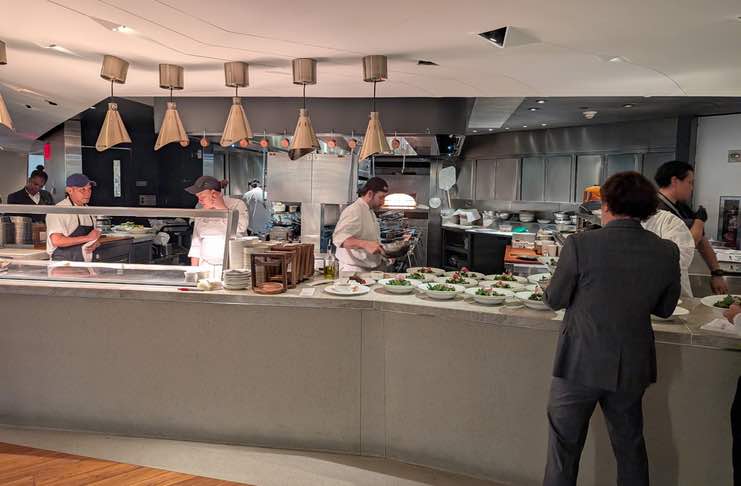 The open kitchen at ATRIO Wine Bar & Restaurant at conrad new york