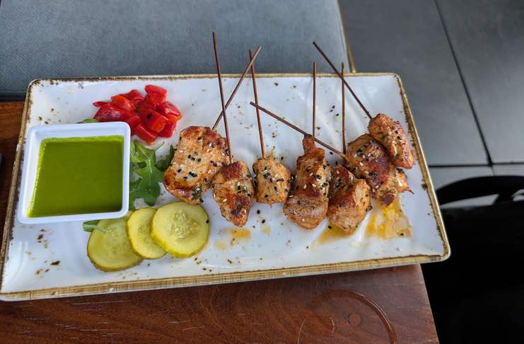 Thai chicken skewers at Elsie rooftop nyc