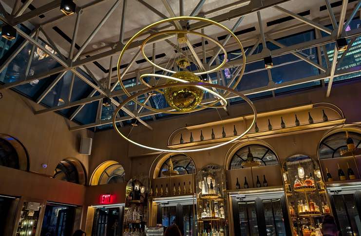 a dazzling disco ball chandelier at Elsie Rooftop NYC