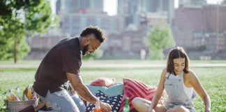 The Ultimate Guide to Planning a Gourmet Picnic a man and woman planning a picnic