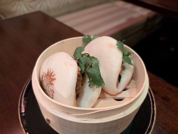 Duck confit bao at lotus bar nyc