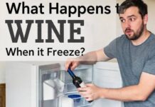 When Wine Freezes, Is It Still Good? Opinion of a Wine Shop Specialist a guy putting a wine bottle in the freezer