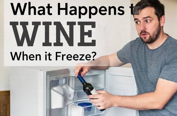 a guy putting a wine bottle in the freezer