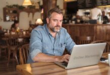 How to Increase Your Restaurant’s Online Visibility restaurant owner trying to increase online visibility of his restaurant