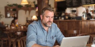 How to Increase Your Restaurant’s Online Visibility restaurant owner trying to increase online visibility of his restaurant