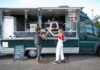Event Catering Prospecting Checklist For Food Trucks Food truck owner reviewing an event catering prospecting checklist before contacting potential clients