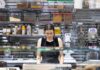 How Restaurants Can Avoid Running Out of Essential Kitchen Supplies Restaurant kitchen staff checking inventory checklist against stocked shelves