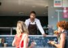 What Can Break a Food Truck Partnership Before the Menu Does Two business partners standing in front of their food truck
